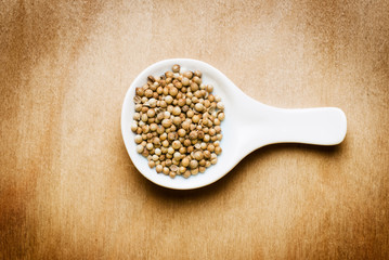 coriander on wood table