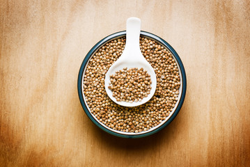 coriander on wood table