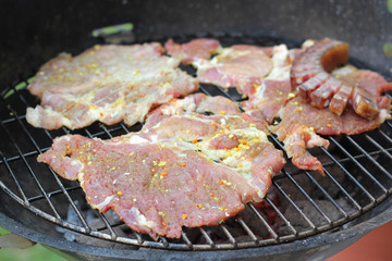 Raw meet on a barbecue