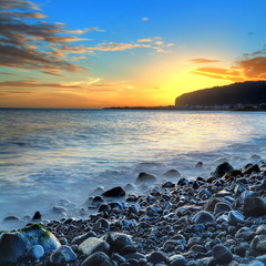Obraz premium Coucher de soleil sur le littoral nord, La Réunion.
