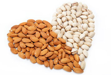 The image of the heart of the almond and pistachio nuts.