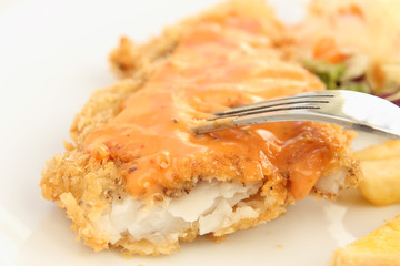 fried breaded fish steak sliced