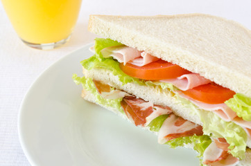 Sandwich with various healthy ingredients isolated on white