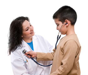 Cute boy tries to use stethoscope of female doctor