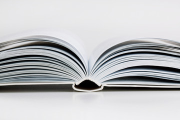 Pages open a thick book