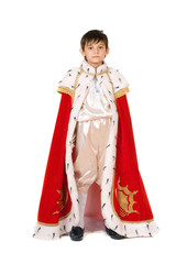 boy dressed in a robe of King