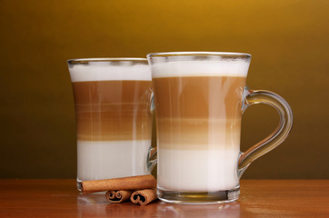 Fragrant сoffee latte in glass cups and cinnamon