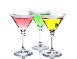 alcoholic cocktails on table isolated on white