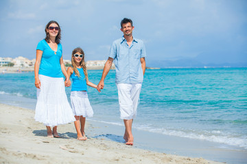 Family having fun on tropical beach