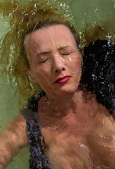 Face of woman underwater