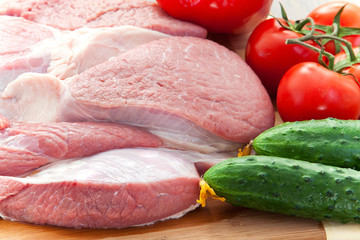 Fresh meat with vegetables on a table