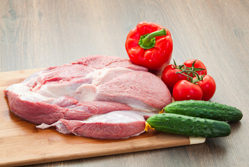 Fresh meat with vegetables on a table