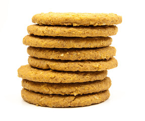stacked wholemeal cookies on a white background