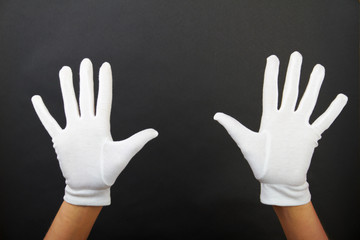 hand of a woman is showing ten fingers