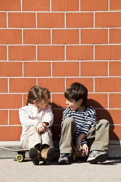 sister and brother discuss