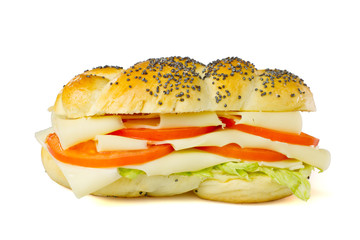 Simple vegetarian sandwich on white background, cheese, tomatoes, lettuce