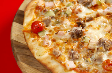 Pizza east with tomato