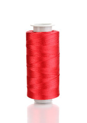 Red bobbin thread isolated on white