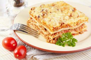 Italian cuisine. Meat lasagna  on the served table