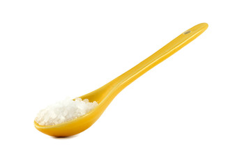 Salt on yellow spoon