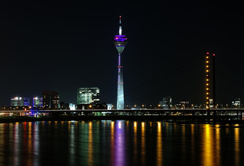 Dusseldorf, Rheinturm TV tower in night illumination