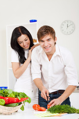 young couple in kitchen