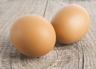 Eggs on wooden background