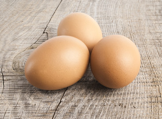 Eggs on wooden background