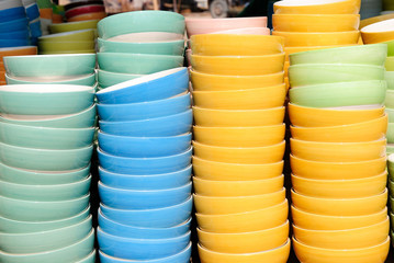 ceramic cups in a basket at the fair