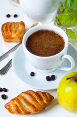Breakfast, coffee and pastries closeup