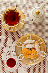 Cup of tee and  heap of cookies, top view