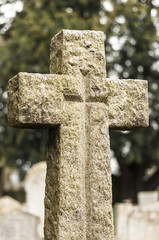 Old stone cross in a Graveyard