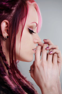 Portrait of woman with dreadlocks hair