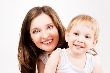 portrait of mother and child, on a gray background