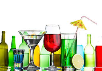 Different alcohol drinks and cocktails on bar