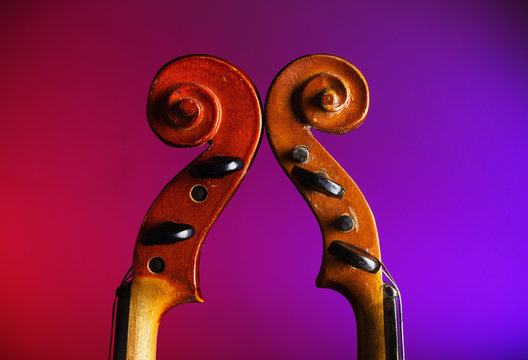 Two vintage violin scrolls