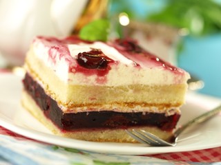 Cake with cherries and cream