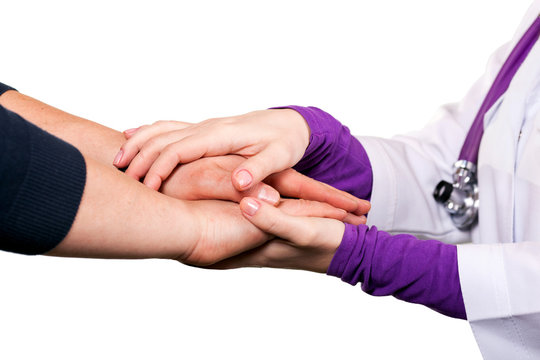 Holding patient`s hand, giving help
