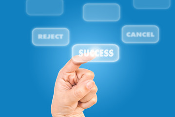 Hand pushing Success word.