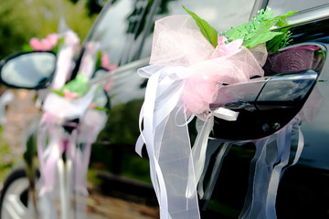 Wedding car decorated with flowers