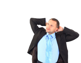 Young businessman sitting on chair against white background