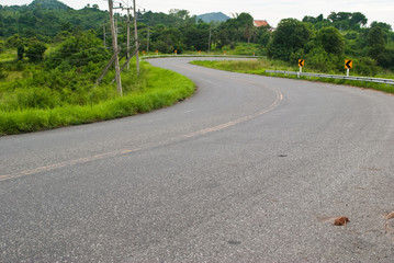 Curve road with the sky and dangerous road.