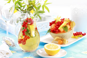 Fresh fruits served in melon bowl