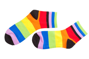 Multicolor child's striped socks isolated
