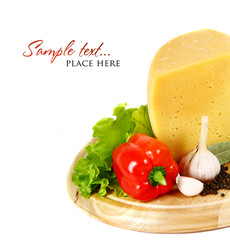 Cheese on a wooden plate