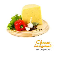 Cheese on a wooden plate