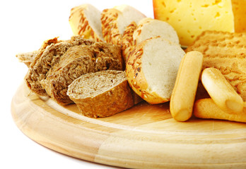 Cheese on a wooden plate