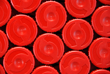 Red plastic bottles