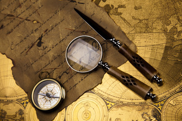 Fototapeta na wymiar Old navigation instrument, map and compass