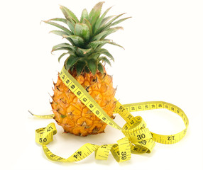 pineapple with a centimeter tape